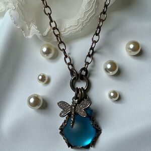 Elegant Bronze and Blue Moonglow Pendant Necklace with Dragonfly Charm